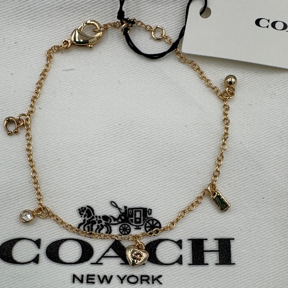 Coach Gold-Tone Charm Bracelet with Dust Bag